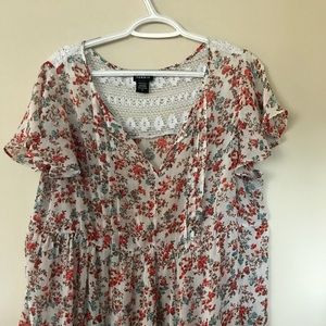 Torrid Floral Blouse with back knit lace detail.